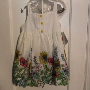 Adorable baby girl floral dress with sunflowers